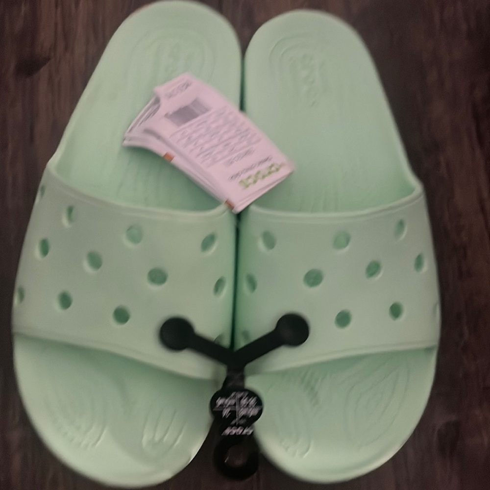 Mint green crocs